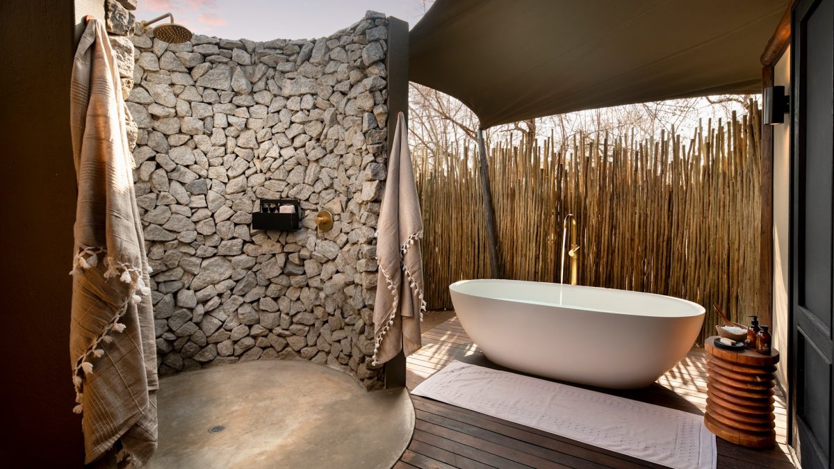 South-Africa-Ngala-Tented-Camp-bathroom-al-fresco-bath-and-outdoor-shower-2-Website-1920x1080-fill-gravityauto-Q_AutoBest